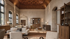 A spacious living room with a fireplace, comfortable seating, and a large wooden cabinet. - Castilla Termal Palacio de Avellaneda  (Penaranda de Duero)