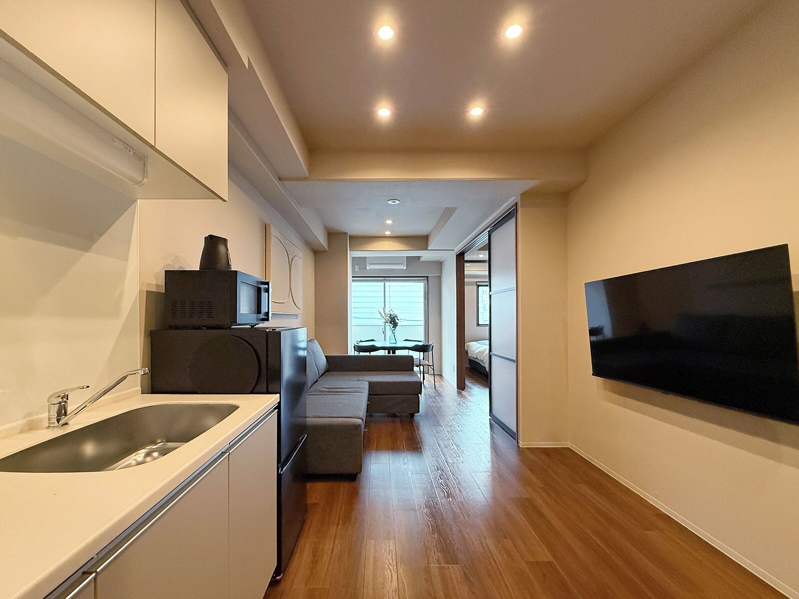 Junior Apartment | Living area | 55-inch Smart TV with cable channels