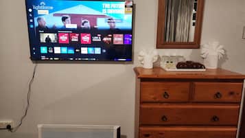 Family Triple Room, Non Smoking, Shared Bathroom | Television