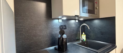 Fridge, microwave, stovetop, cookware/dishes/utensils