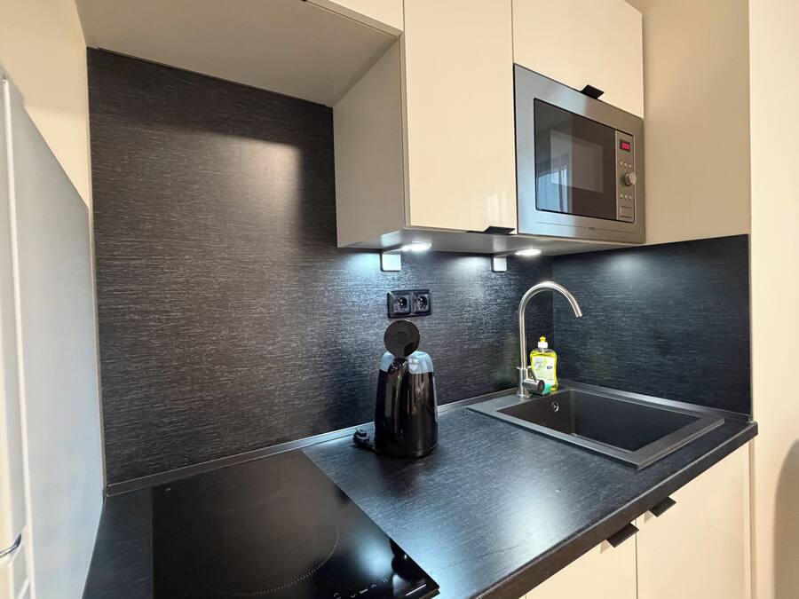 Fridge, microwave, stovetop, cookware/dishes/utensils