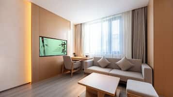 Family Suite, City View | Living area | LCD TV