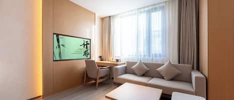 Family Suite, City View | Living area | LCD TV