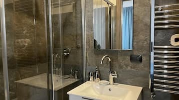 Hair dryer, towels, soap, toilet paper