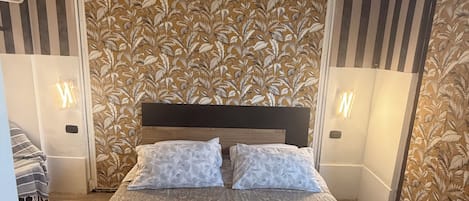 Habitación triple Confort | Wifi gratis y ropa de cama