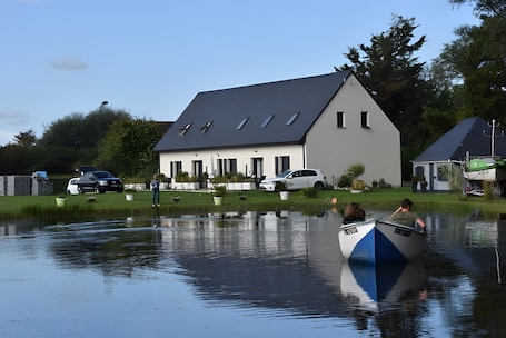 Exterior. Holiday Home 'Le T'chot Pierre 1' with Lake View, Shared Garden and Wi-Fi
