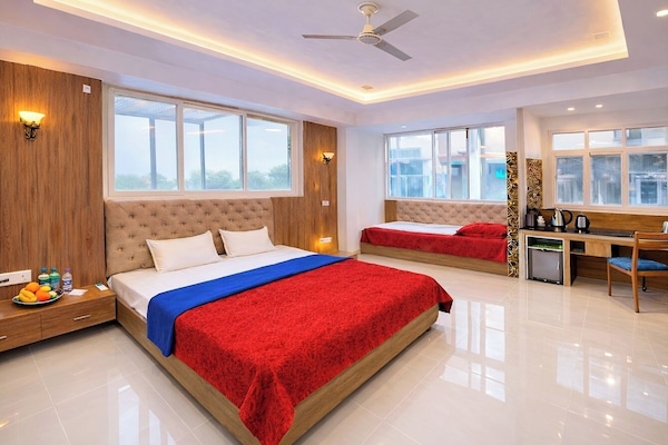 Premium bedding, desk, laptop workspace, soundproofing