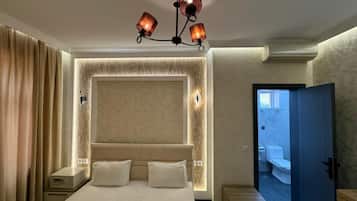 Premium bedding, in-room safe, blackout curtains, soundproofing