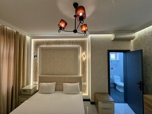 Premium bedding, in-room safe, blackout drapes, soundproofing