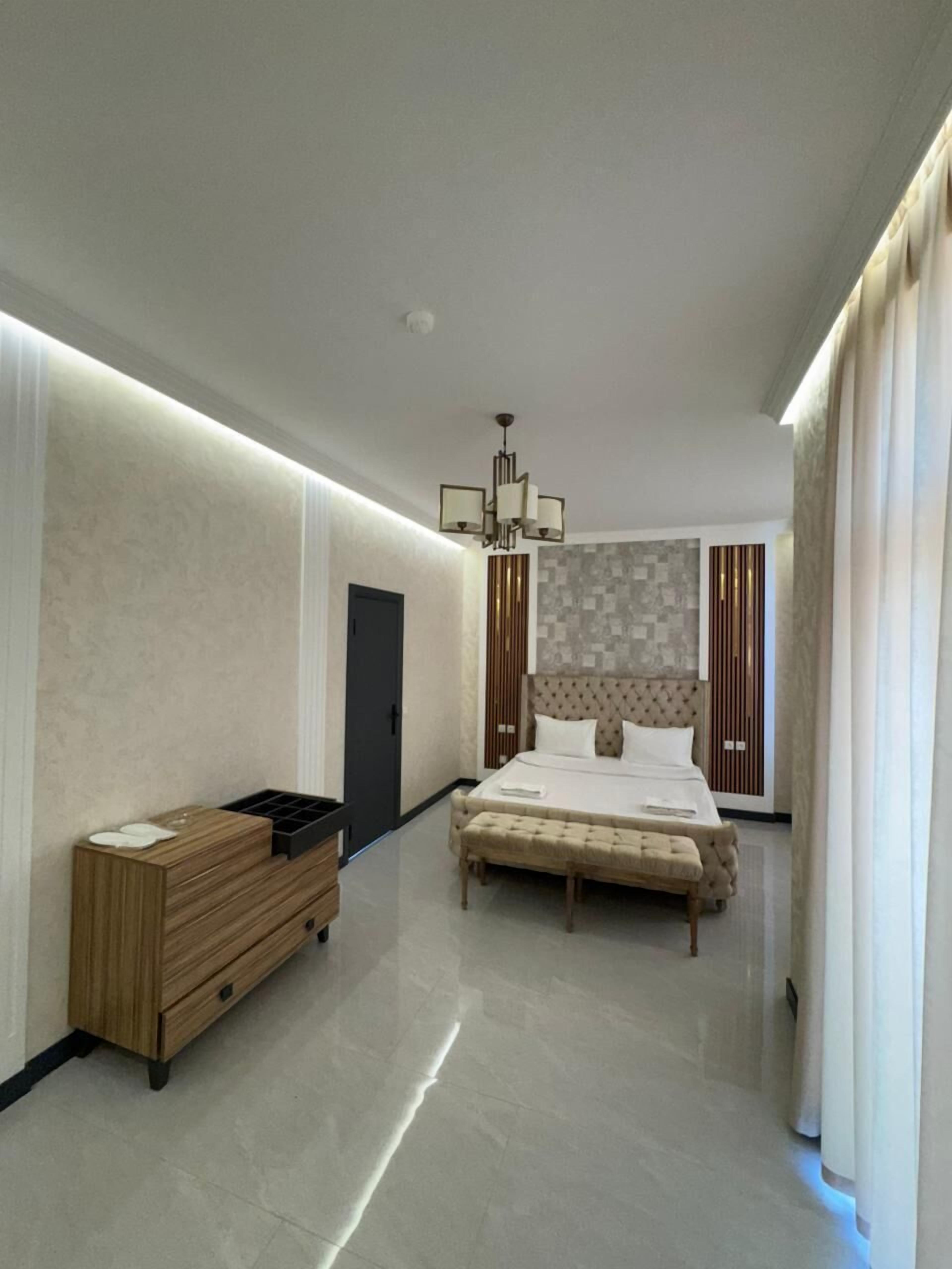Premium bedding, in-room safe, blackout curtains, soundproofing