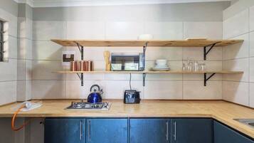 Microwave, stovetop, toaster, cookware/dishes/utensils