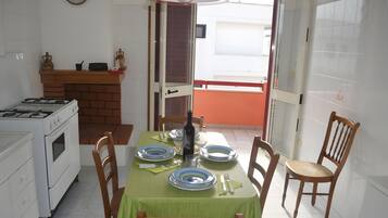 Fridge, stovetop, cookware/dishes/utensils