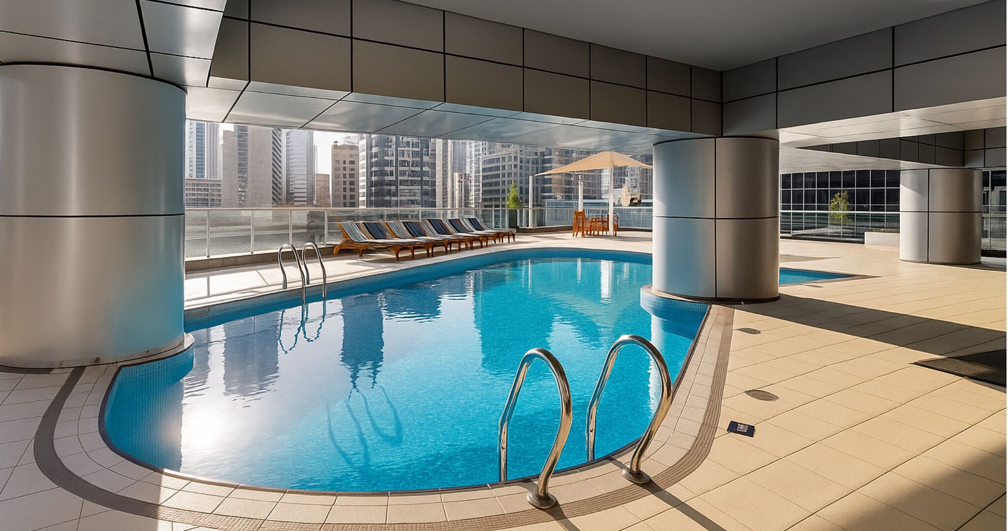 2 outdoor pools, open 8:00 AM to 10:00 PM, pool umbrellas, pool loungers
