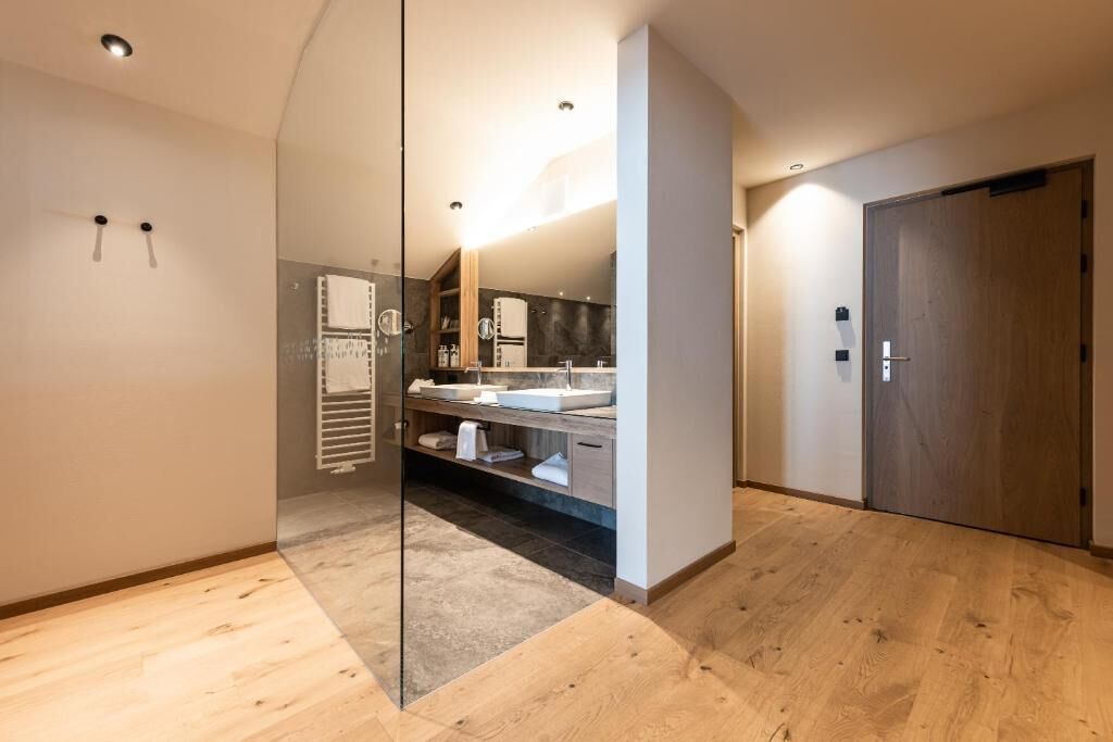 Family Room, Hill View | Bathroom | Shower, free toiletries, hair dryer, slippers