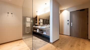 Family Room, Hill View | Bathroom | Shower, free toiletries, hair dryer, slippers