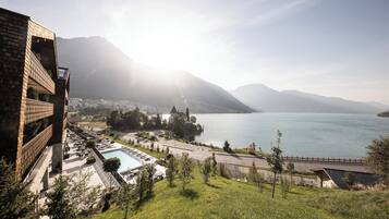 2 indoor pools, outdoor pool, open 7:00 AM to 8:00 PM, pool loungers