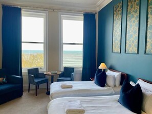 Camera Deluxe con letto matrimoniale o 2 letti singoli, vista mare | Ferro/asse da stiro, Wi-Fi gratuito