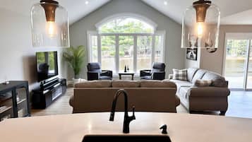 TV, fireplace, books, stereo