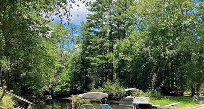 The Ultimate Two-Lake Access Bungalow: Peaceful Riverfront Living