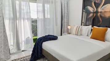Apartment, City View | Desk, laptop workspace, iron/ironing board, free WiFi