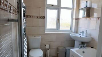 Hair dryer, towels, soap, toilet paper