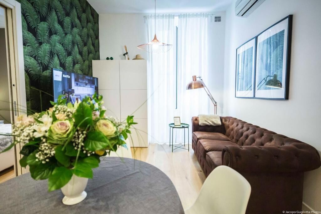 Deluxe-Apartment, Balkon, Stadtblick | Wohnbereich