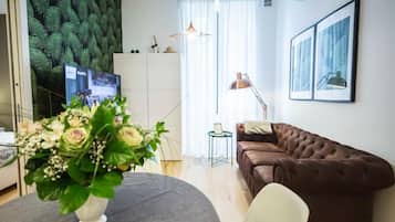 Deluxe-Apartment, Balkon, Stadtblick | Wohnbereich