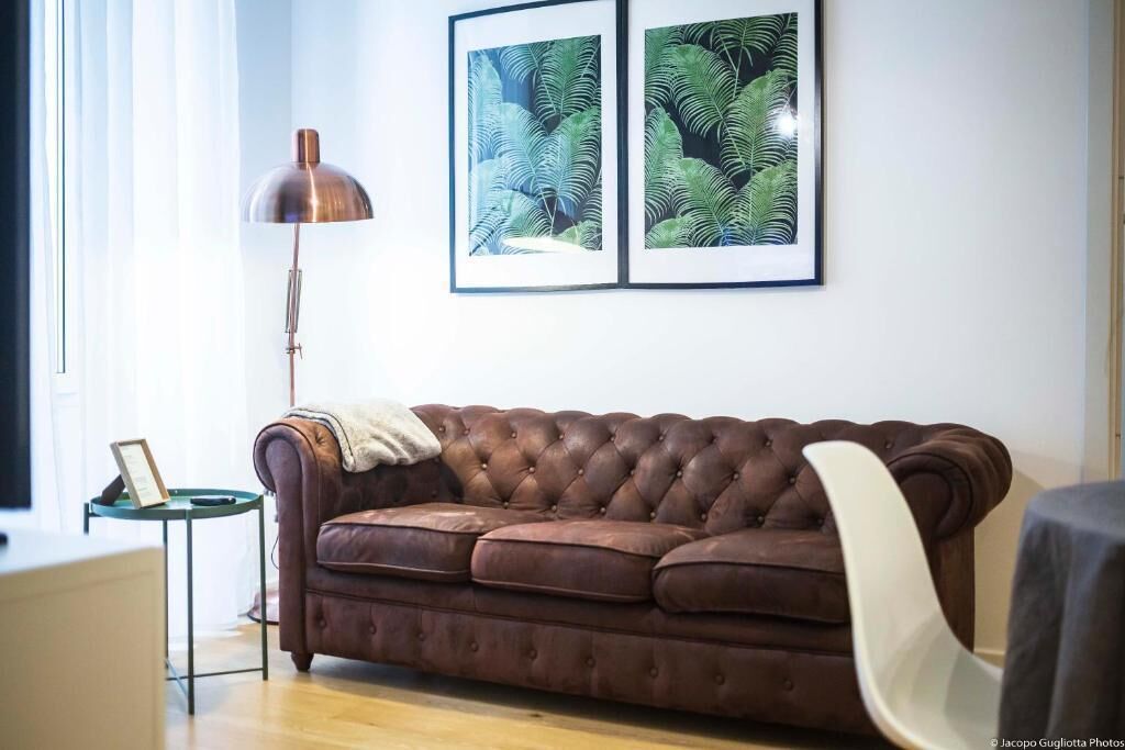 Deluxe-Apartment, Balkon, Stadtblick | Wohnbereich