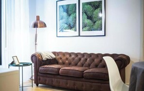 Apartamento Deluxe, balcón, vistas a la ciudad | Zona de estar