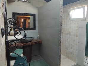 Shower, hair dryer, towels, toilet paper