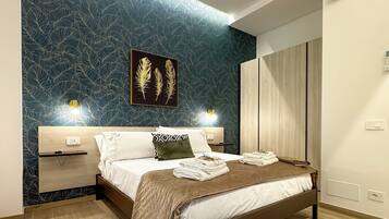 Apartment, Garden View | In-room safe, desk, laptop workspace, soundproofing