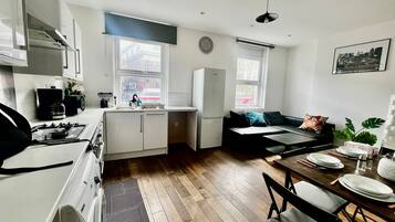 Fridge, microwave, stovetop, coffee/tea maker