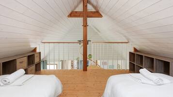 2 slaapkamers, een strijkplank/strijkijzer, beddengoed