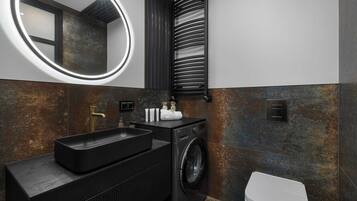 Shower, hair dryer, towels, shampoo
