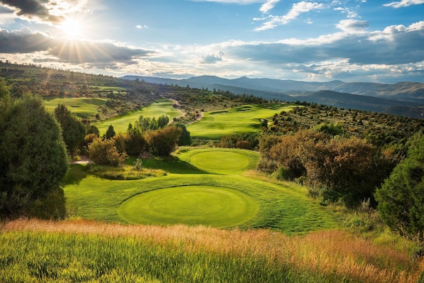 A golf course with rolling hills and a clear sky. - 3BR Condo In Bachelor Gulch, Ski In/out (Avon)