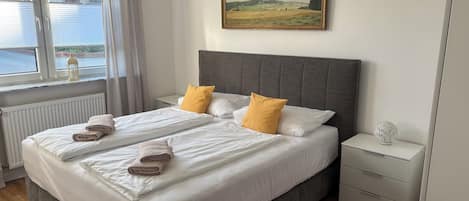 2 habitaciones, tabla de planchar con plancha, cuna de viaje y wifi