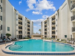 The Indies House Community Pool + Exterior of Complex - Indies House 502 | Stunning Getaway (Ormond Beach)
