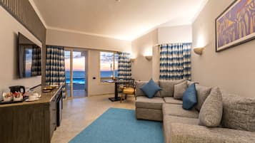 Suite Premium, patio, pemandangan laut | Area keluarga | Printer