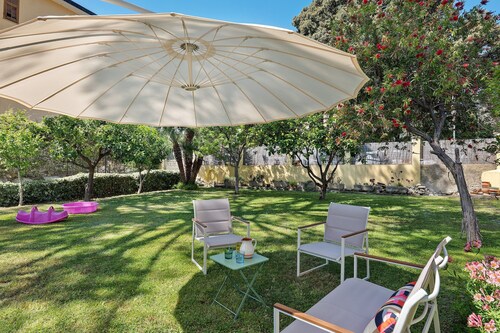 'Casa Lena' two-room apartment with garden access and Wi-Fi