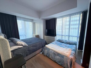 1 bedroom, iron/ironing board, WiFi, bed sheets - Cozy 1-bedroom condo in serene Cebu City with AC and gym (Cebu City)