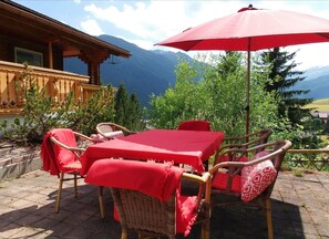 Outdoor dining - Chalet Dargun Bünter, (Camischolas/Sedrun). by Interhome (Camischolas)