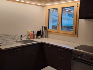Fridge, oven, cookware/dishes/utensils - Biala Casa Pintga Streiff, (Rueras). by Interhome (Rueras Dieni)