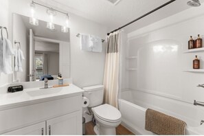Hair dryer, towels, soap, shampoo