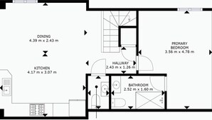 A floor plan with a dining area, kitchen, primary bedroom, bathroom, and hallway. - Villa Lorenza by Interhome (Moraira)