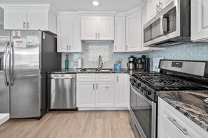 Fridge, microwave, oven, stovetop - Sandy Shores Escape! Private Home with Putting Green, Fire Pit, Beach Gear, Bicycles, Kayaks, & More (Panama City Beach)