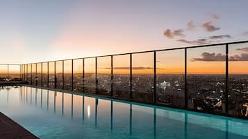 Deluxe Apartment | Pool | Outdoor pool, open 8:00 AM to 11:00 PM, pool loungers