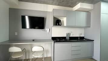 Panoramic Apartment | Private kitchen | Fridge, stovetop, cookware/dishes/utensils