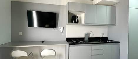Panoramic Apartment | Private kitchen | Fridge, stovetop, cookware/dishes/utensils