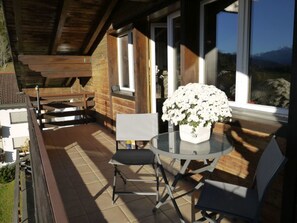 Outdoor dining - Marmotta, (Laax Dorf), 21052 by Interhome (Laax)