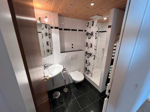 Residenza Cristallo, (Flims Dorf). 3.5 Zimmer Partérre Wohnung (97m2) mit Garte by Interhome